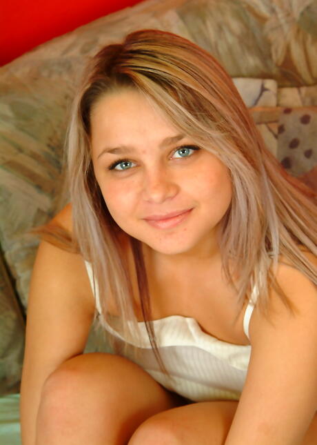 Slender teen Mila revealing big boobs and masturbating 